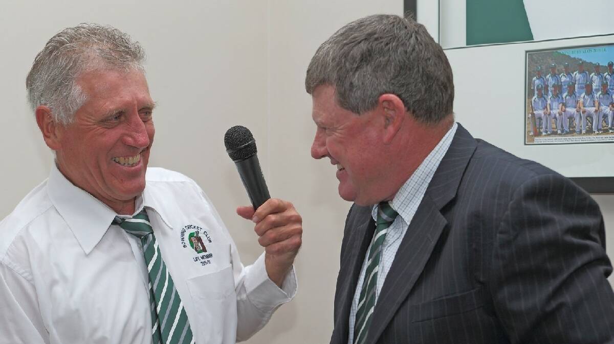 Peter Schofield was presented with the Club-person of the Year award by president Duncan Burleigh at the Buffalos presentation night on Saturday. Photo: RS Williams.