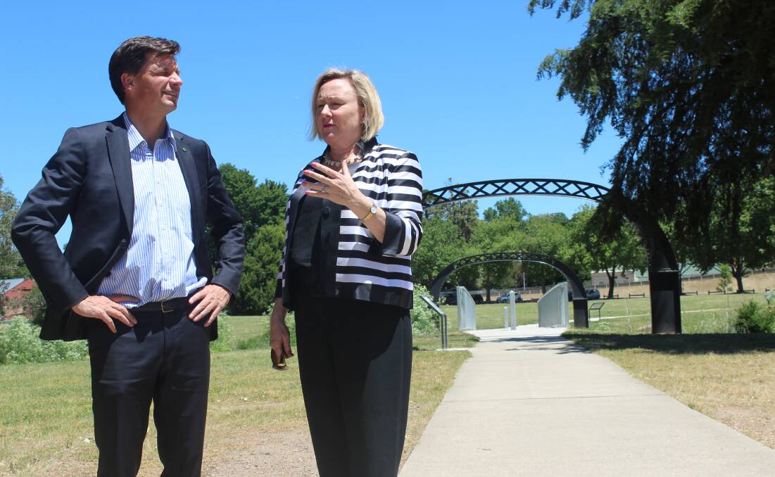 Federal Member for Hume Angus Taylor and Yass Valley Mayor Rowena Abbey on the Riverbank Park cycleway where several streets lights will be installed early next year. Photo: Supplied.
