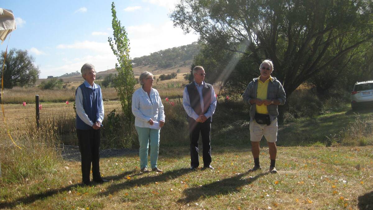 Mrs Liz Bray, Genevieve Starr (President Jerrawa Creek Landcare Group), Upper Lachlan Shire Mayor John Shaw and Ngunnawal custodian/elder Wally Bell as the welcome to country is delivered at the formal opening of the Bruce Bray Riparian Walk in Gunning.
