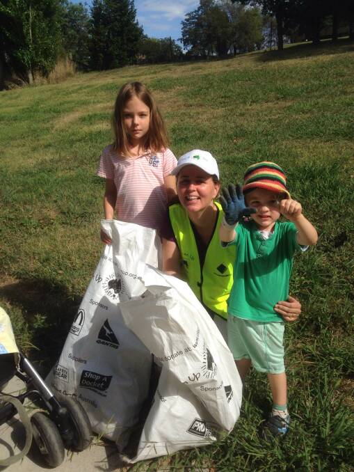Local kids, Poppy aged 8 and Apollo aged 3, helping out Councilllor Jasmin Jones in the clean up at Riverbank Park. 