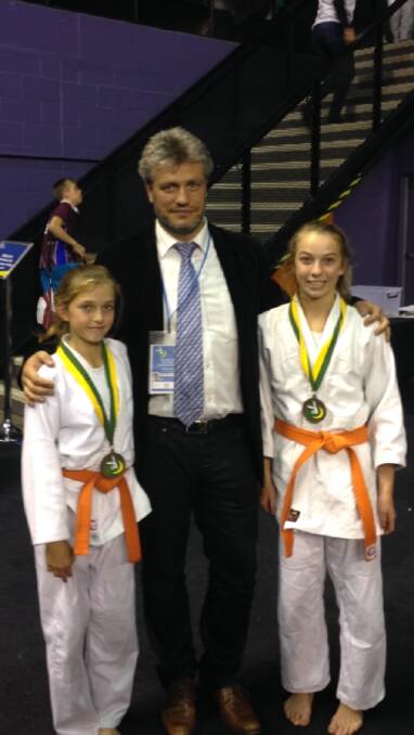 Cynthia and Jayde with an International Judo Federation Member recently.