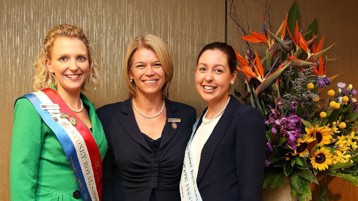 Yass Showgirl Emily Witt is pictured with Kennedy Tourle (2013 The Land Royal Easter Showgirl) and member for Burrinjuck Katrina Hodgkinson at the opening night function of the Sydney Royal Easter Show on April 10. Photo: Supplied.