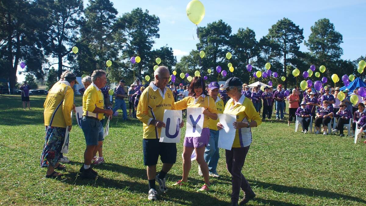 Ken Bell and the Relay For Life committee take their letters. Photo: Chris Hunt.