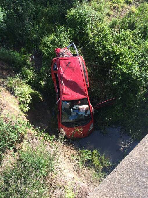 This red sedan was driven off the highway and down into Bowning Creek at the weekend.