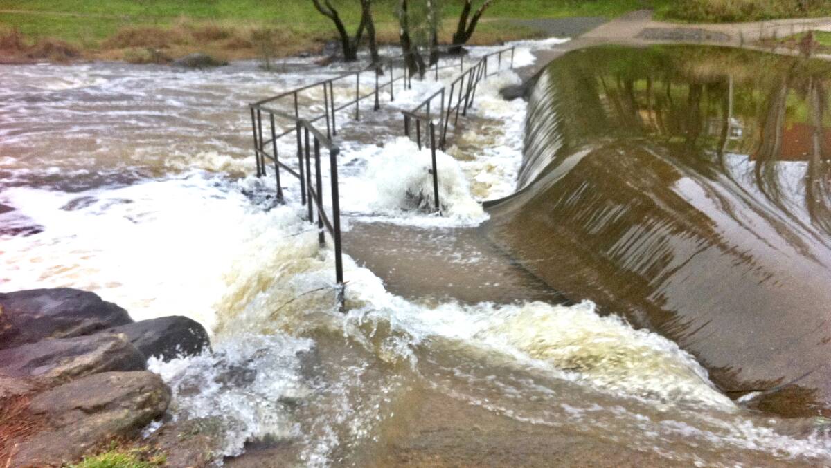 The Yass River crossing at Riverbank Park flooded on August 25. Photo: Leisa Doggett. 
