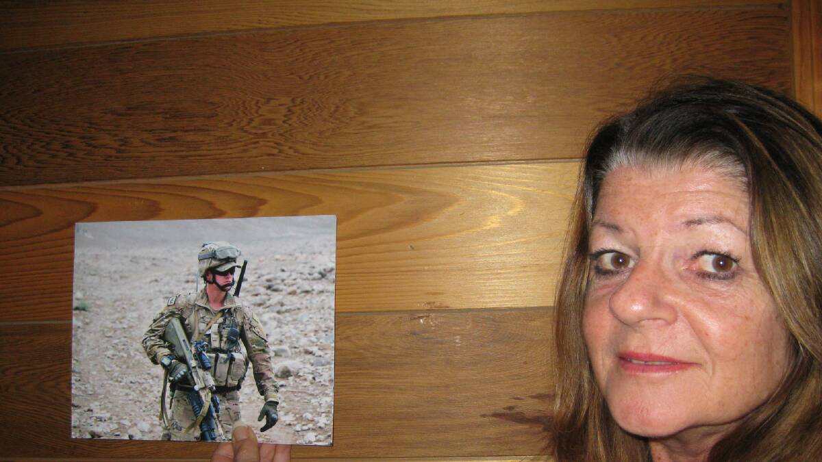Gunning's Carol Sharp with a photo of her son Matthew Sharp taken during his tour of duty in Afghanistan.  Matt is now at university.