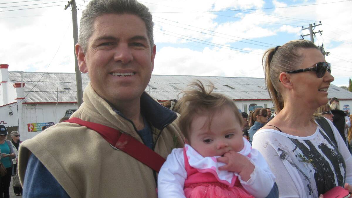 John Duncan with seven-month-old Lilli and Kate Cucchiaro at the Gunning Anzac Day ceremony.
