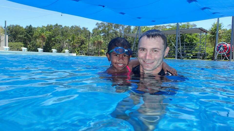 Ben Spencer and sister Tia recently spent two weeks in far north Queensland teaching kids to swim. Photo: Supplied.