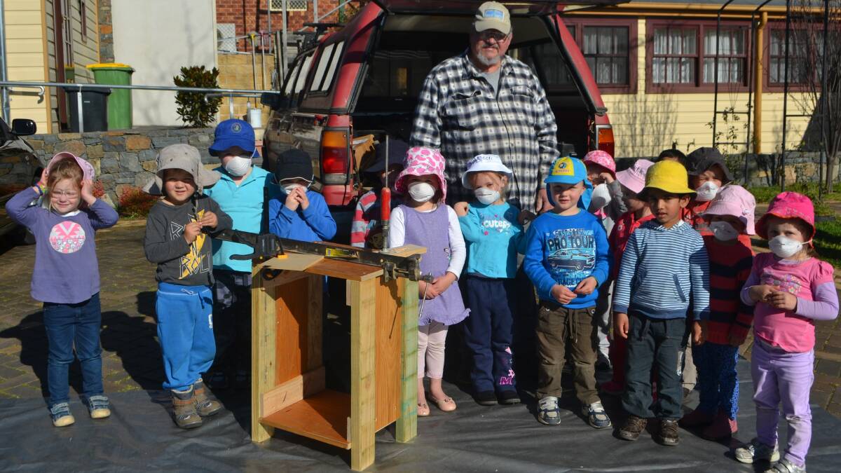 Montessori students enjoying a presentation from Yass Men's Shed president David Staines. Photo: Jessica Cole. 