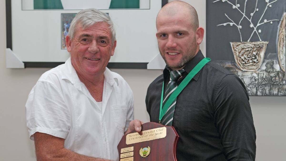 Andrew Swaffield was presented with the Cricketer of the Year award by Gary Ware at the Buffalos presentation night on Saturday. Photo: RS Williams.