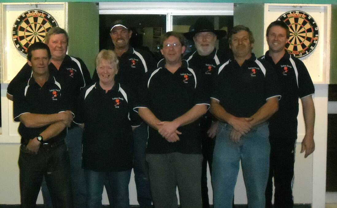The Dalton Devils darts outfit played in the Yass Competition for 2014 and won the B-grade division, beating Yass Golf Club 7 games to 4 in the final. Well done Dalton! The team is (back) Bill Rankmore (Pig), Dave Wiseman, John Searl (Pale Rider) and Chris Hewitt (Huey) and (front) Allan Bush (Scrub), Kathy Holmes, Troy Pye and Wayne Apps (Wayno). Photo: Supplied.

