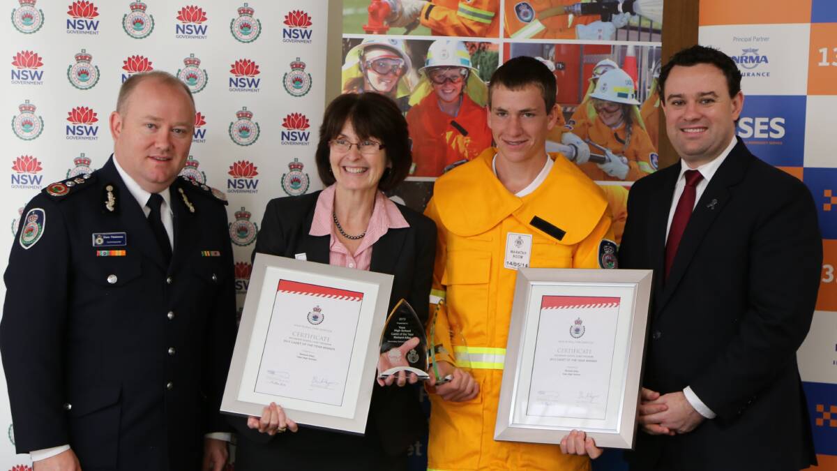 NSW RFS Commissioner Shane Fitzimmons (left) and Minister for Police and Emergency Services Stuart Ayers (right) with Yass High principal Sandra Hiscock and 2014 RFS Cadet of the Year Richard Alley. Richard, a year 11 Yass High student was given the award at a special ceremony at Parliament House in Sydney recently. Photo: Supplied.