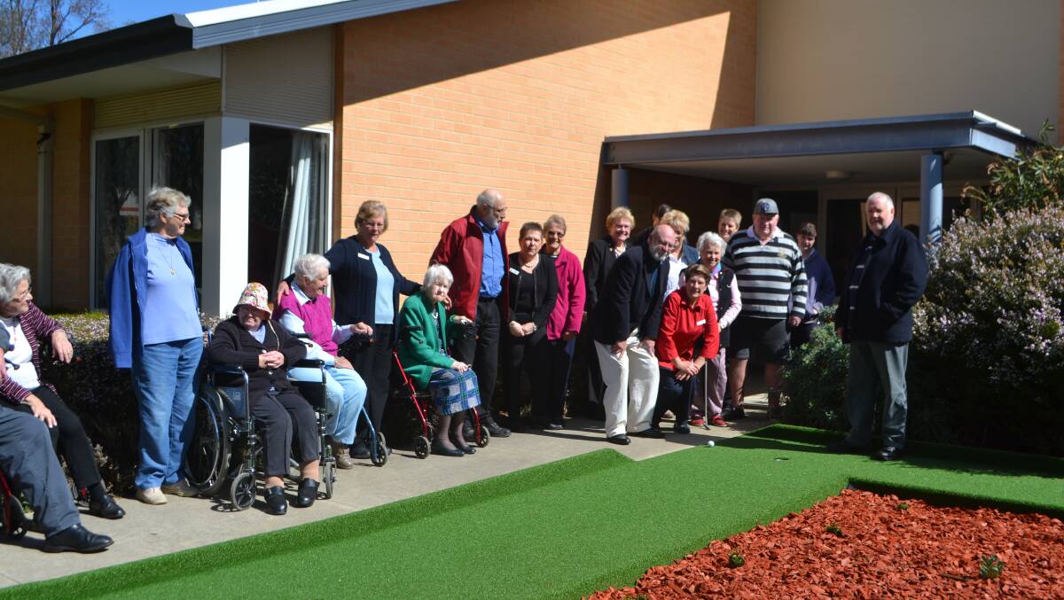 Organisers and participants enjoy the new two hole course.