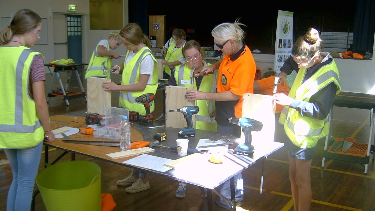 Girls from Yass High's year 9 and 10 classes taking part in the Supporting and Linking Tradewoman workshop. Photos: Supplied.