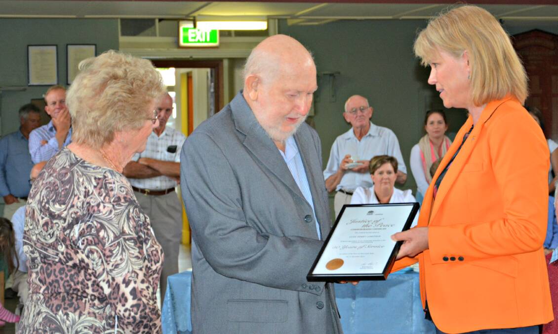 Katrina congratulating Clive Langfield on attaining 50 years as a Justice of the Peace. 
