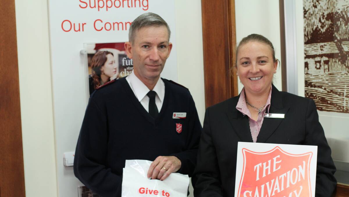 Major Warren Lock with Westpac Bank Manager Olivia Pearce are readying themselves for a big Red Shield Appeal.