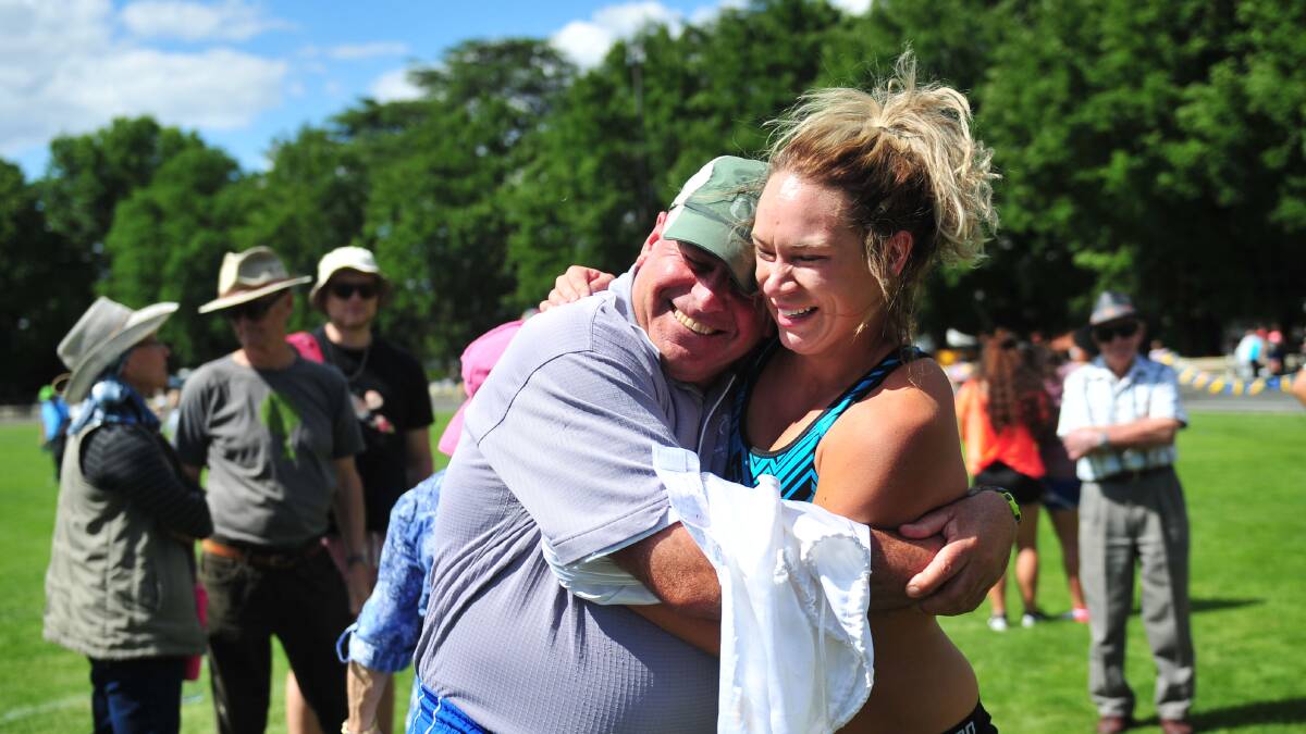 Celebrating the victory with her coach Dennis Goodwin. Photos: Melissa Adams.