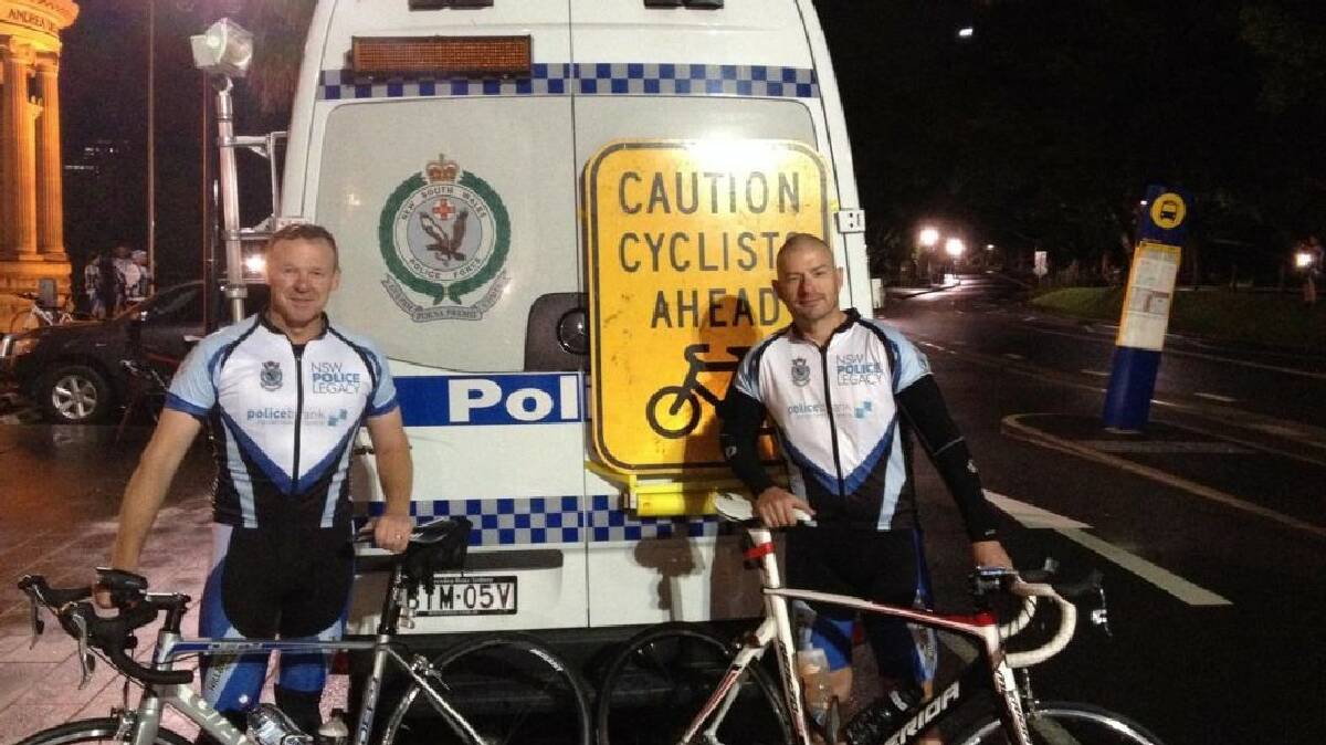 Yass policemen Paul Lloyd and Jeremy Farr arrived at the Police Wall of Remembrance on Sunday after three days of riding. Photo: Supplied.
