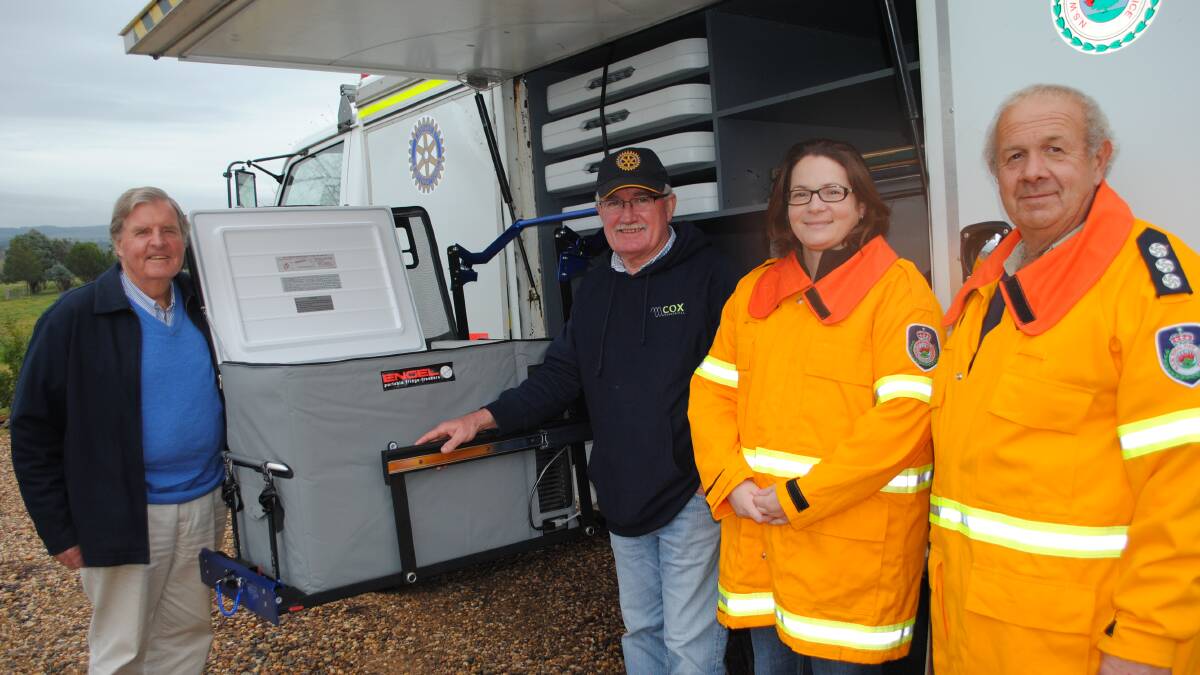 Rotary director Kim Turner, president Cyril Cox, catering group organiser Belinda Reynolds and Max Hedges with the state-of-the-art catering truck. Photo: Joe McDonough.