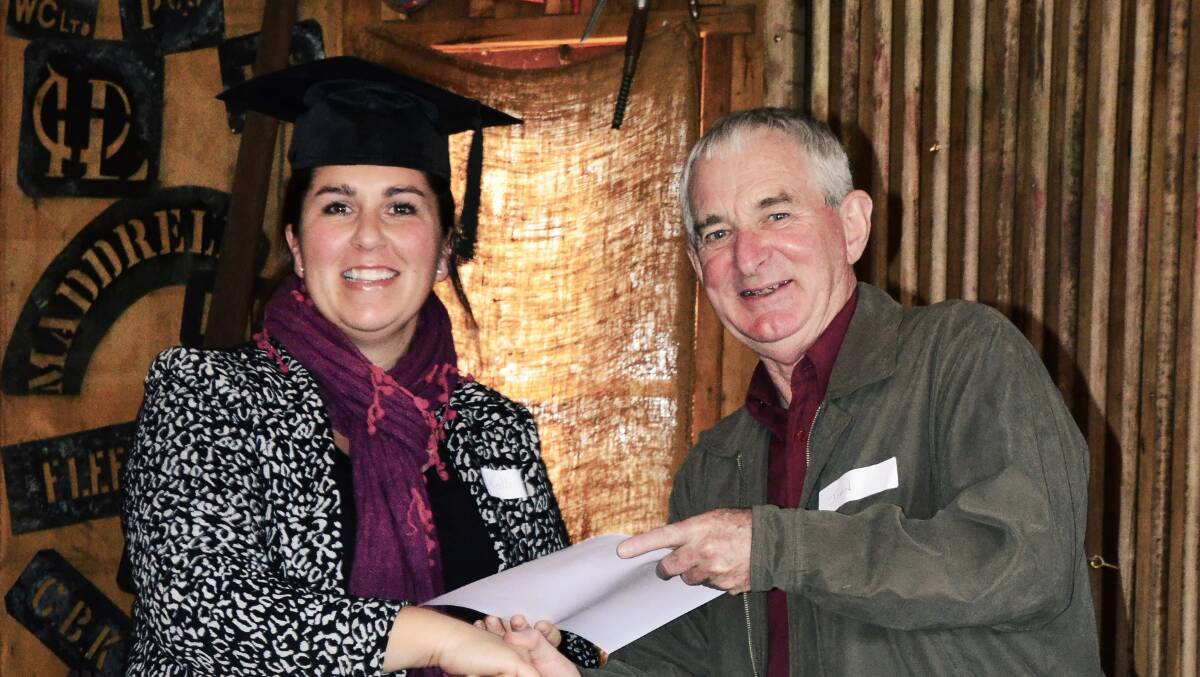 Kali Rajic, from Yass River, receives her South East Local Leaders graduation certificate from South East Landcare representative John Carter from Bermagui.

