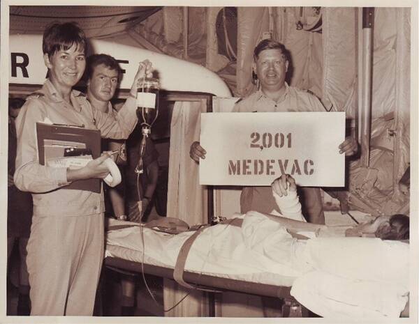 Barbara in 1968 with the 2001st patient, a Kiwi soldier, under her care as a medevac nurse.
