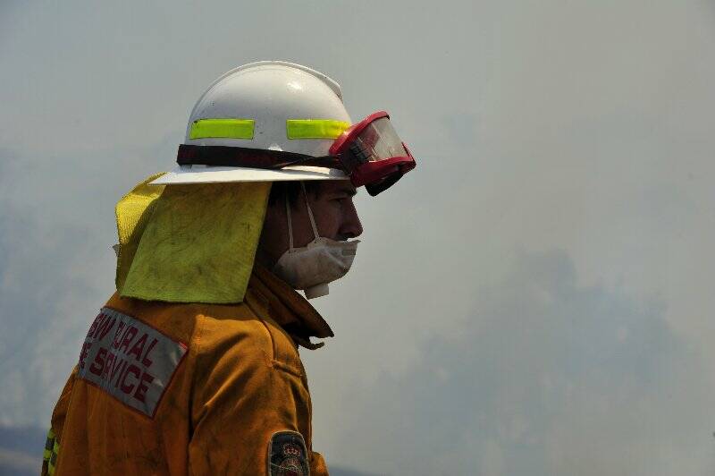 A firefighter on the ground at the Cobbler Road bushfire. Photo: Jay Cronan.