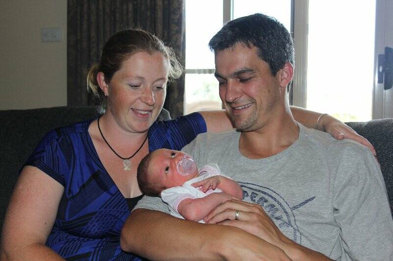 Tara and Josh Leighton with their new baby, and Yass' first baby in the new year, Ava Jane.