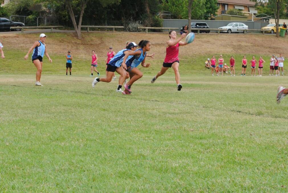 Te Whanau (blue) were beaten by Melbourne City (pink) in the semi-finals of the women's A-grade competition. Photo: Oliver Watson
