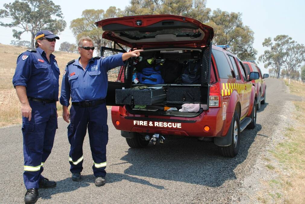 Inspectors Steven Hayes and Graham Jarrett of Fire and Rescue NSW will be on alert if Yass is to be affected by the fire to the west.