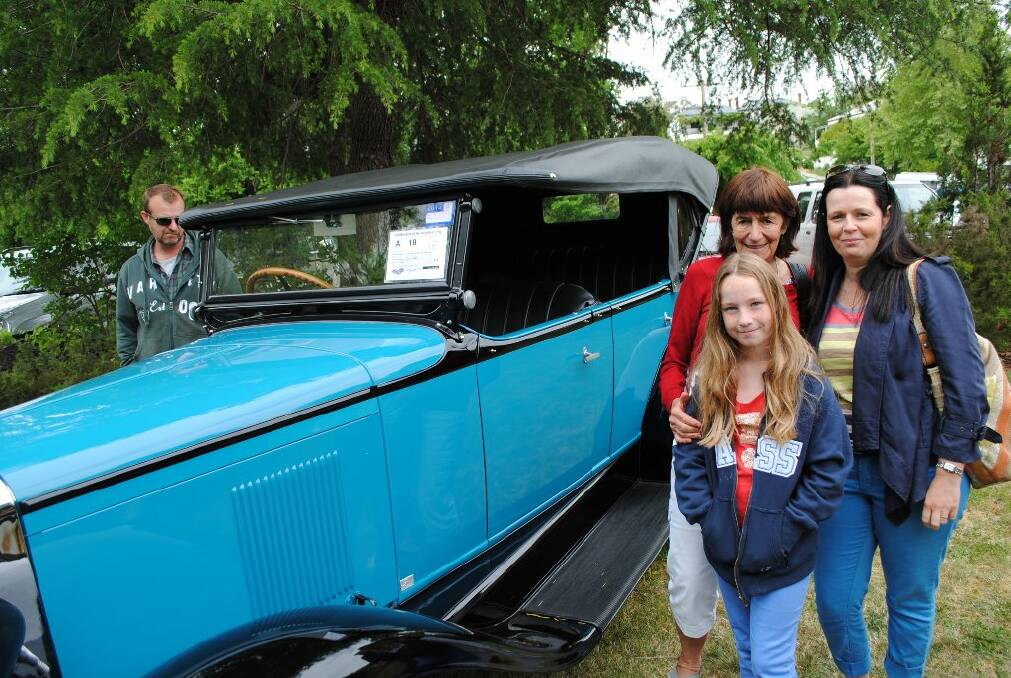 Maddie, Kaye and Lisa Baldwin with a a 1929 Chevrolet Tourer.