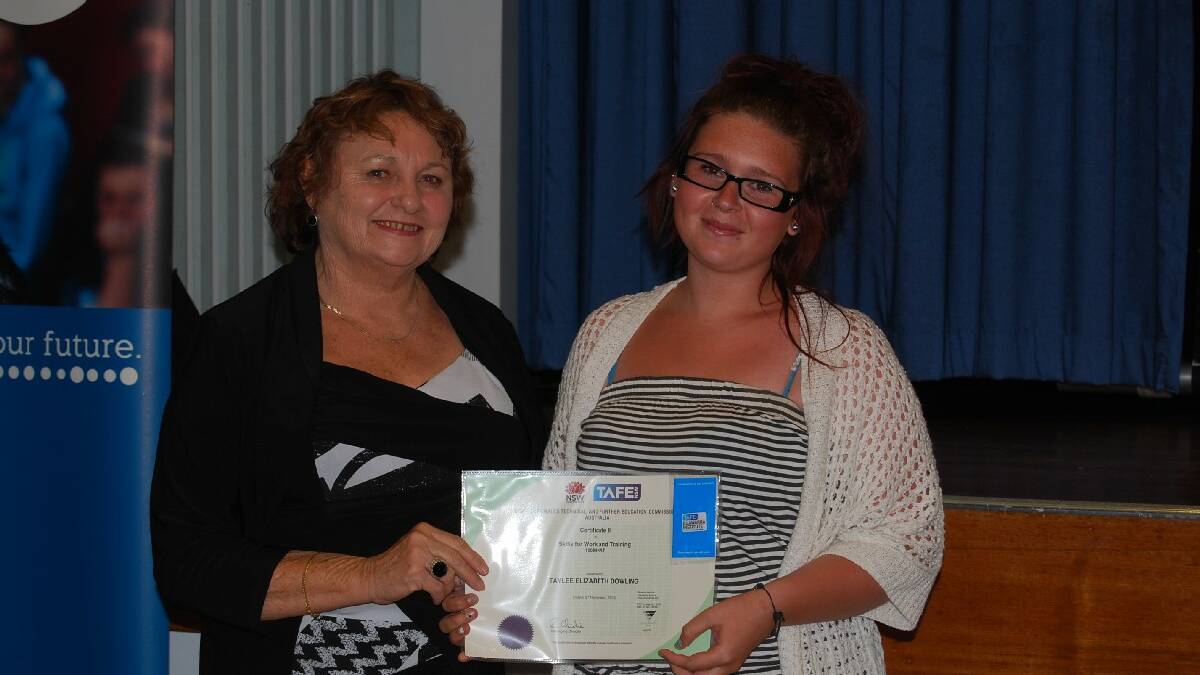 Director Dianne Murray with graduate Taylee Dowling receiving her Certificate II in Skills for Work and Training.