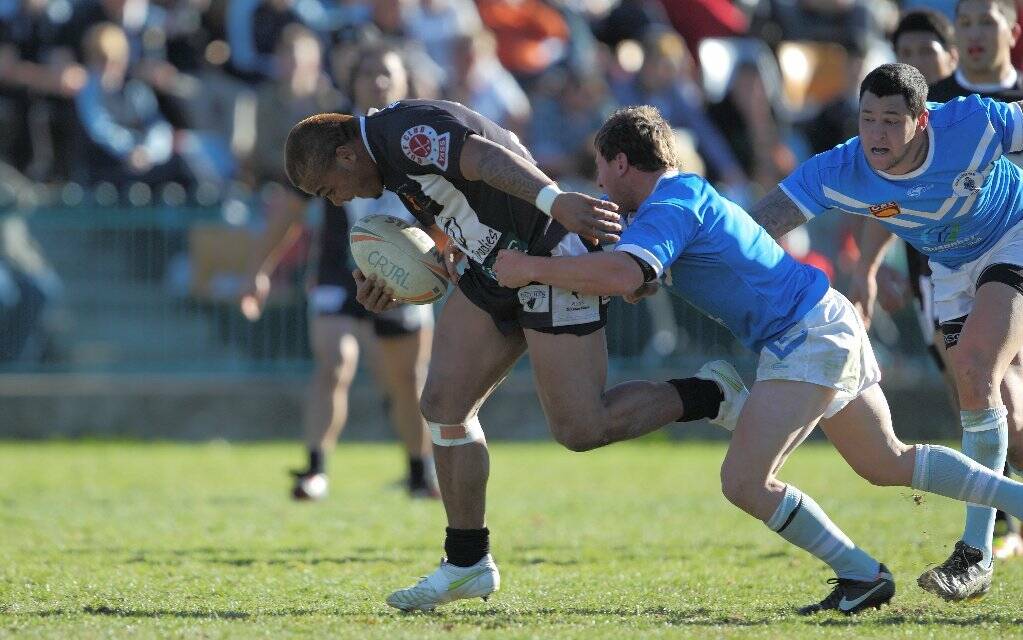 Allen Malau charges forward in the Magpies game against the Queanbeyan Blues last week.