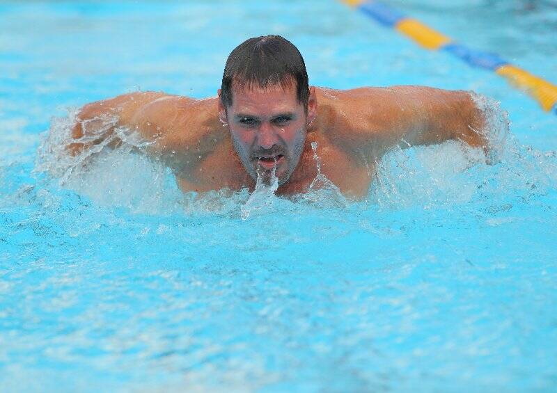 Duncan Waugh, of Yass, participates in the 25-metre butterfly event. He finished in second place in the over 30's division. Photo: RS Williams.