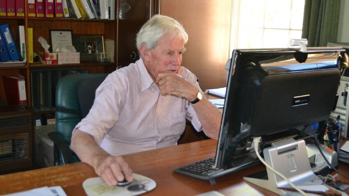 Brian at his office preparing for the upcoming Annual General Meeting which took place last week. Photo: Oliver Watson.