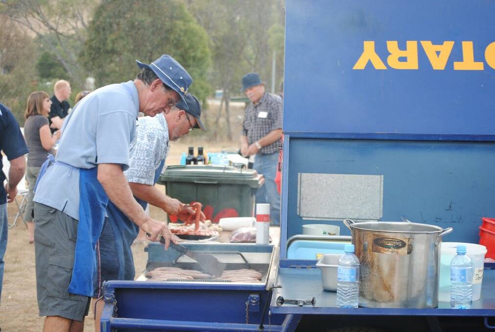 Rotary volunteers worked hard to provide a delicious Aussie-style barbecue.