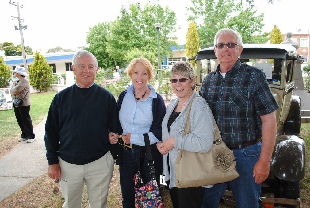 Peter and Jan Arentz with Kerri and Greg Kelly. They are in front of a 1928 Ford A Tudor.