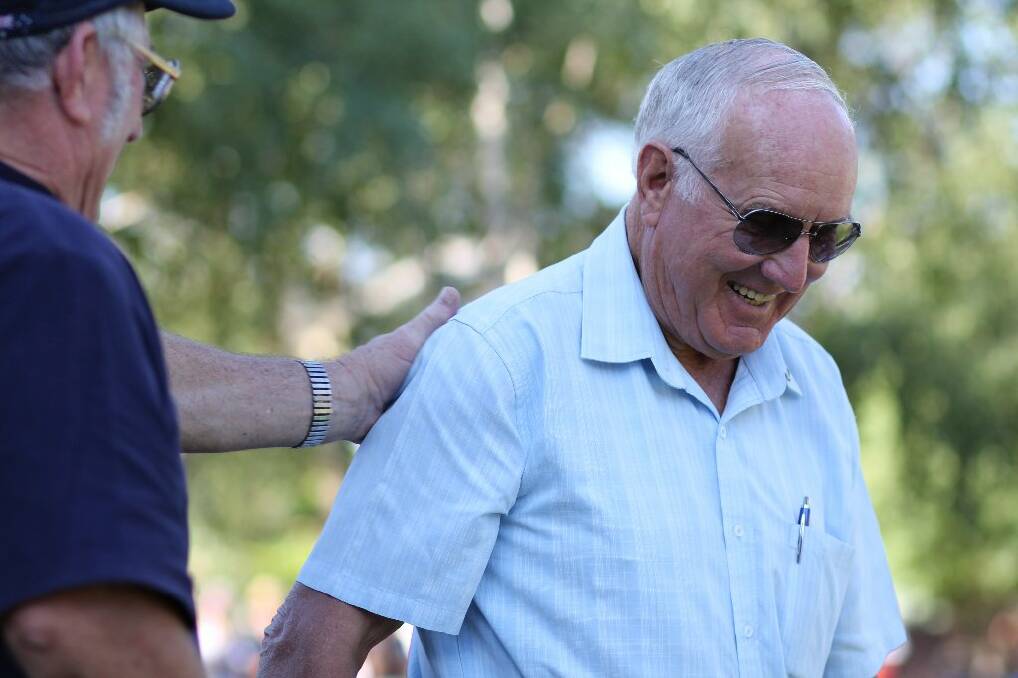 Jim Field gets a pat on the back after recieving the award for Yass Senior Citizen of the Year. Photo: Tiffany Grange.