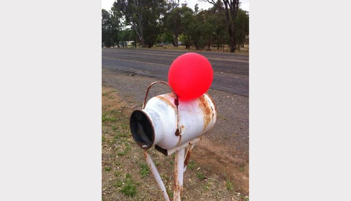 This balloon was seen tied to a letter box at Bookham on Friday. Photo: Contributed.