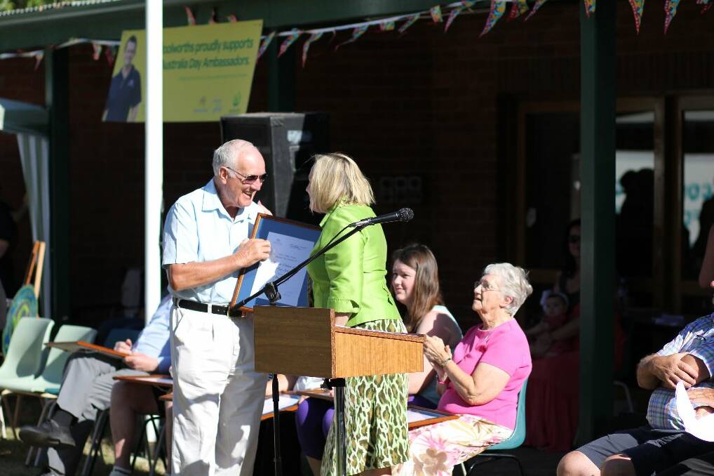 Rowena Abbey presents Jim with his award. Photo: Tiffany Grange.