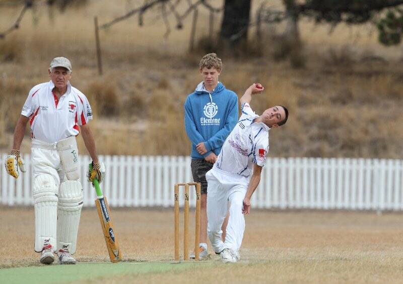 A Murrumbateman bowler puts everything into a delivery on Saturday. Photo: RS Williams.