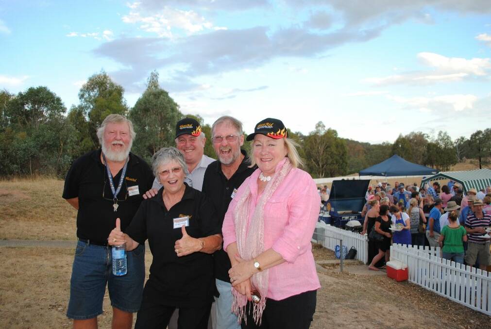 HELP AT HAND: BlazeAid’s Col Coleman, Colleen Waterson and Gary Waterson with Harden Shire Mayor Chris Manchester (third from left) and Yass Valley Mayor Rowena Abbey (right). 