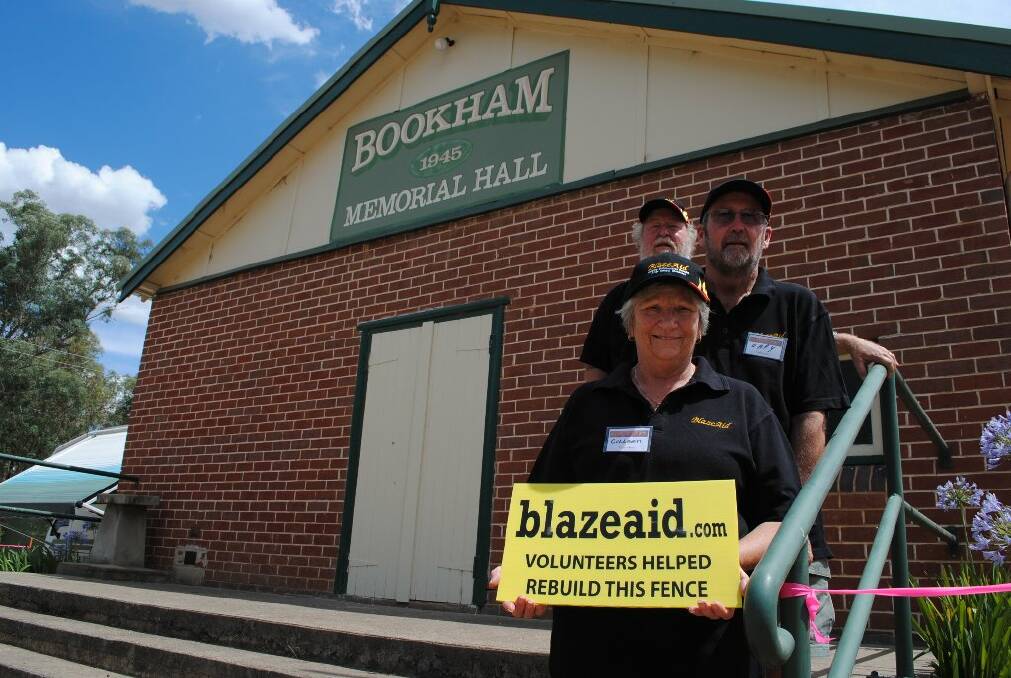 BlazeAid volunteers (from back) Col Coleman and Gary and Colleen Waterson at their base, Bookham Memorial Hall.
