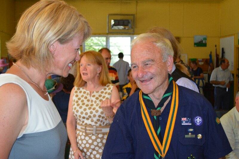 Burrinjuck MP Katrina Hodgkinson congratulates on of our earliest Queen's Scouts, Robert Curll.
