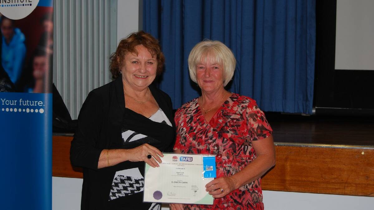 TAFE Illawarra Institute Director Dianne Murray with graduate Elizabeth Cairns in Certificate III in Aged Care.