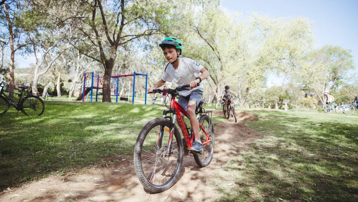 Aiden Isbister, 11, at the Watson Pop-Up Bike Track. Picture: Dion Georgopoulos