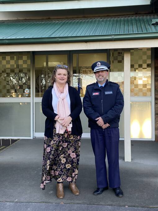 Volunteer Cecilia McKenzie with Hume Police District Aboriginal Engagement Officer Ben Bowles. Photo: Supplied.