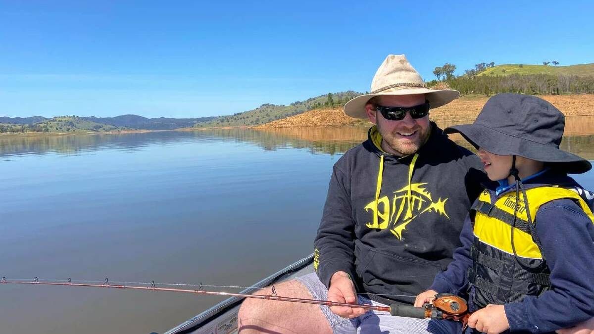 Justin Smith with his son Huxley at Wyangala Dam. Photo: Supplied 