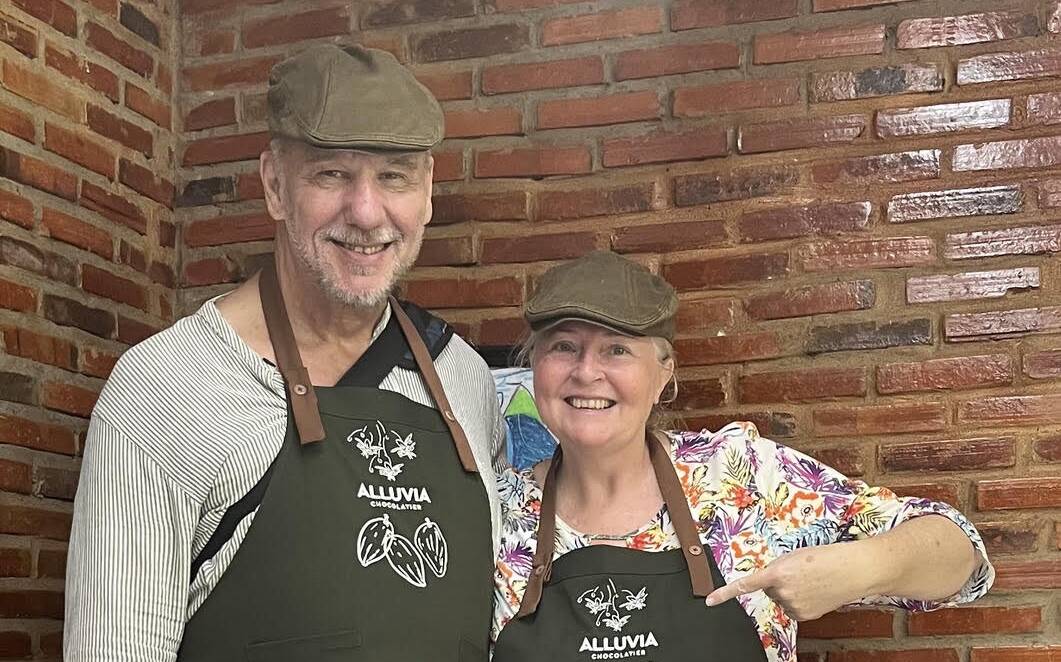 Ken and Mary-Lou in a chocolate factory on the Mekong Delta, Vietnam while she was writing her novel, The Chocolate Factory. Picture supplied Ken and Mary-Lou in a chocolate factory on the Mekong Delta, Vietnam while she was writing her novel, The Chocolate Factory. Picture supplied