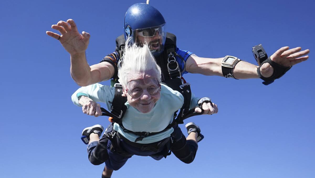 Dorothy Hoffner, 104, falls through the air with tandem jumper Derek Baxter. Picture by Daniel Wilsey via AP