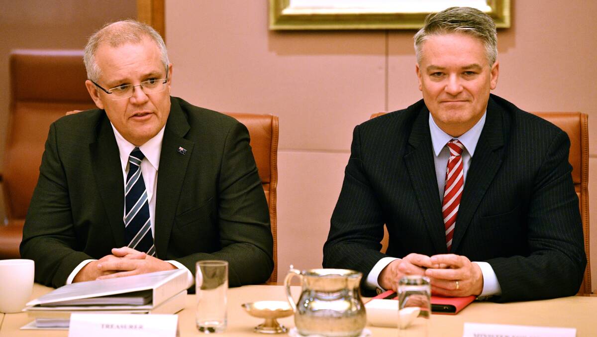 Treasurer Scott Morrison and Finance Minister Mathias Cormann. Picture: AAP